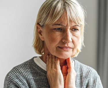 Frau mit Dysphonie